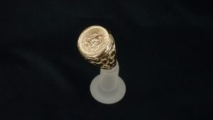 Mexican 5 peso coin in 14k gold nugget style setting