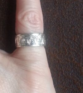 Silver Ring on Pinkie Finger